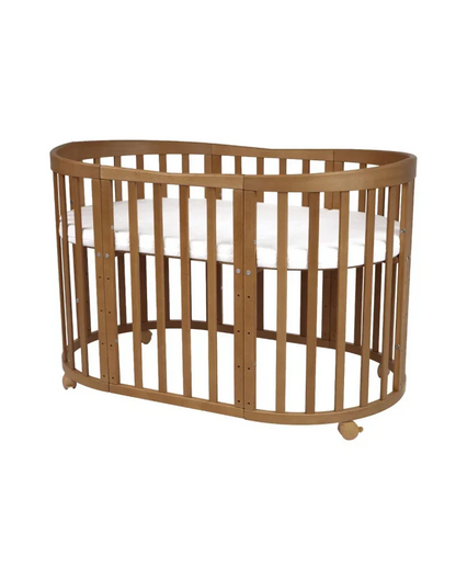 Babybett 7-in-1 – Ein Bett für viele Jahre - mitwachsend | Ovale Form